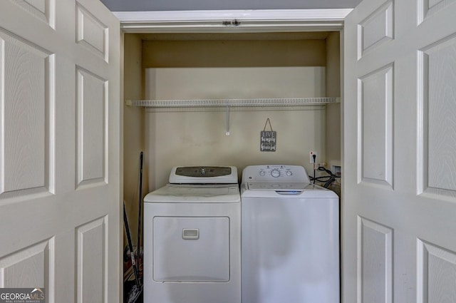 washroom featuring separate washer and dryer