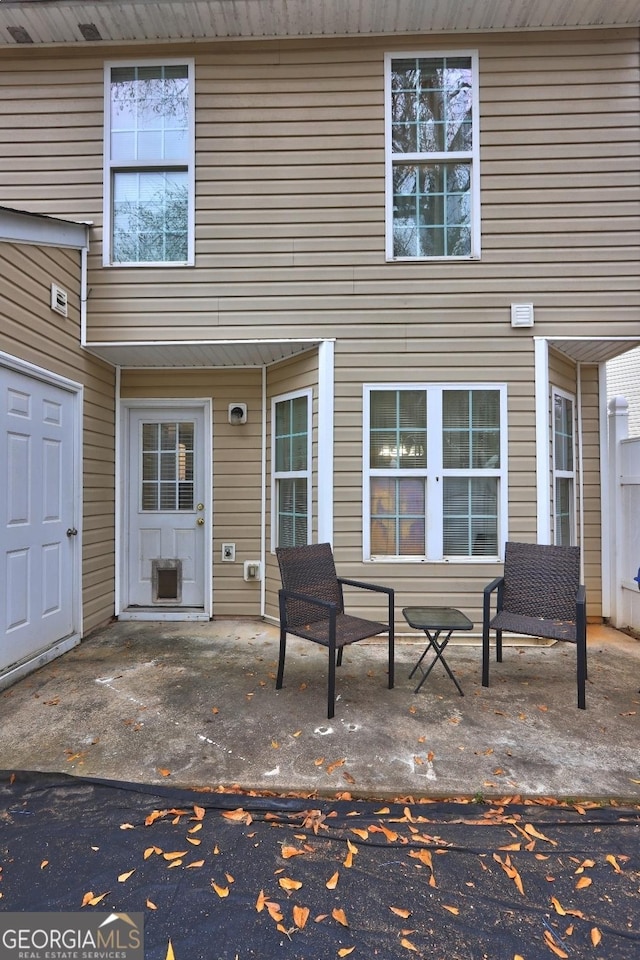 rear view of property with a patio