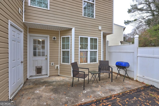 view of patio with a grill