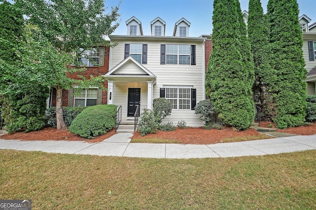 view of front of home with a front lawn