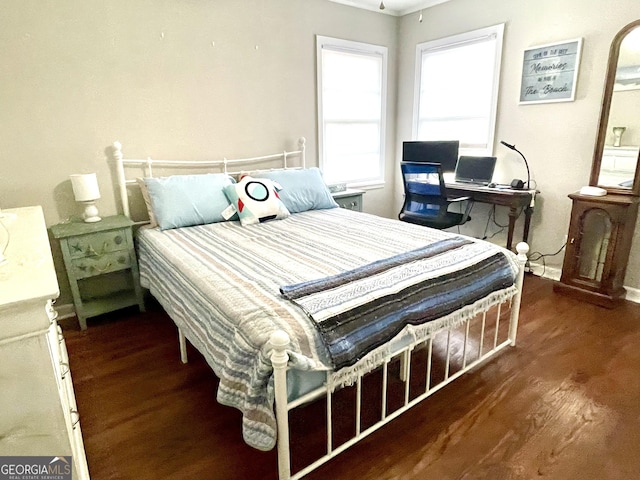 bedroom featuring dark hardwood / wood-style floors