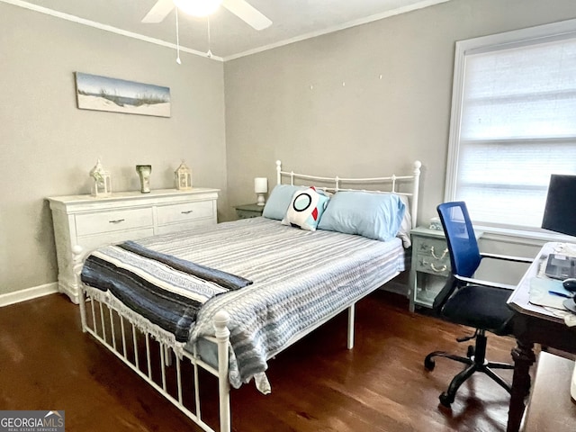 bedroom with ceiling fan, dark hardwood / wood-style flooring, and crown molding