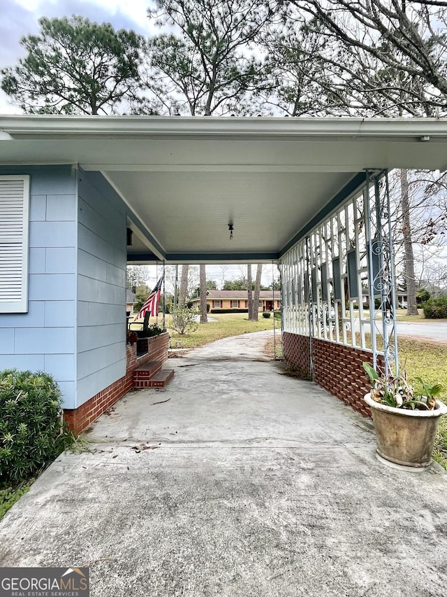 view of parking with a carport