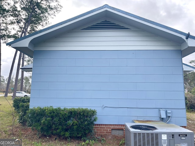 view of property exterior featuring central AC unit