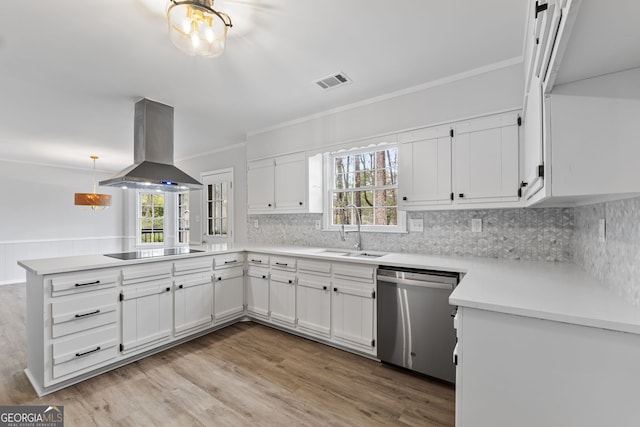 kitchen featuring white cabinets, dishwasher, sink, and island exhaust hood