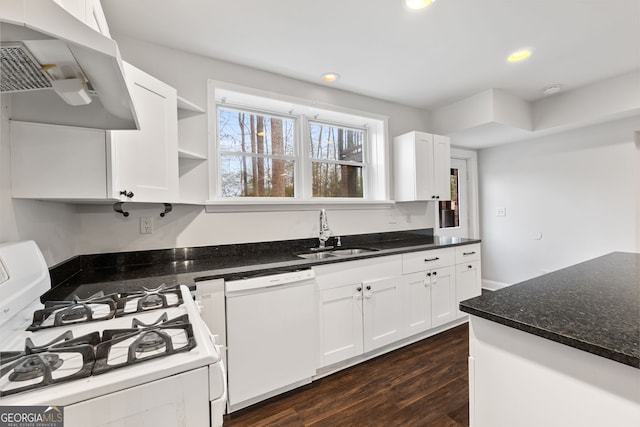 kitchen featuring white cabinets, dark hardwood / wood-style flooring, white appliances, and sink