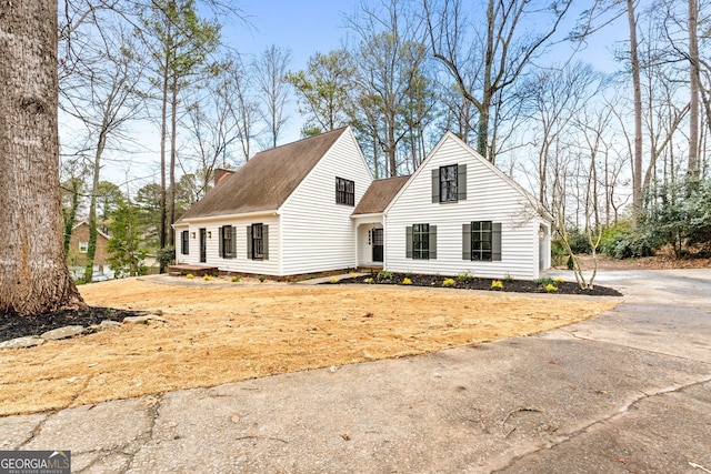 view of new england style home