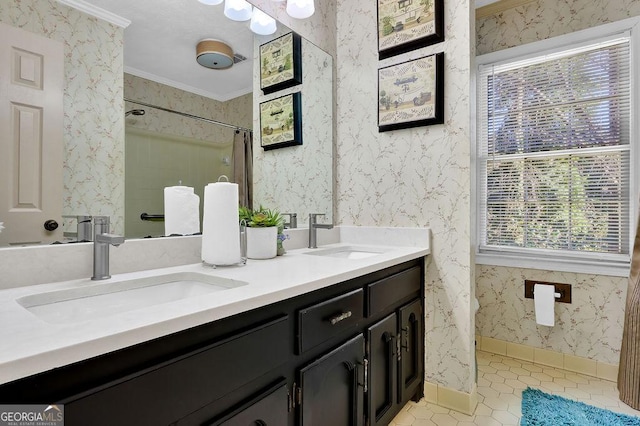 bathroom with tile patterned flooring, vanity, walk in shower, and ornamental molding