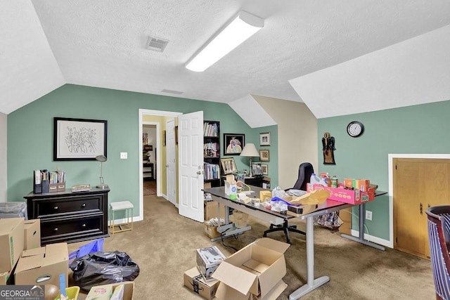 office with carpet flooring, a textured ceiling, and lofted ceiling