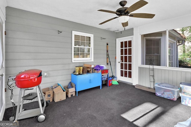 view of patio featuring ceiling fan