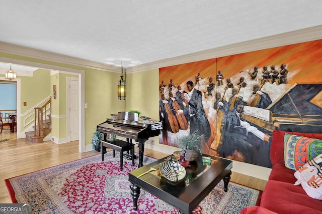 interior space with hardwood / wood-style flooring and crown molding