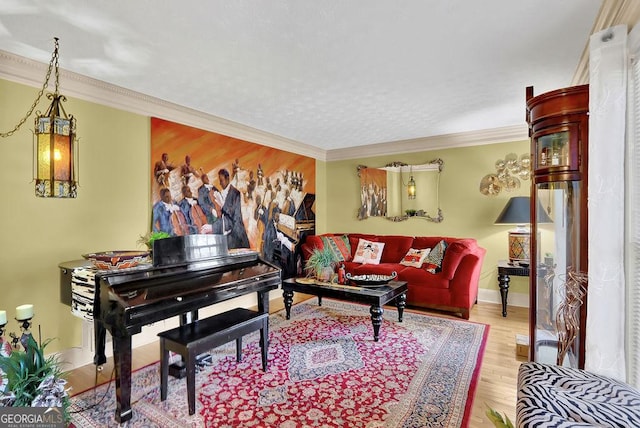 living room with light wood-type flooring and crown molding