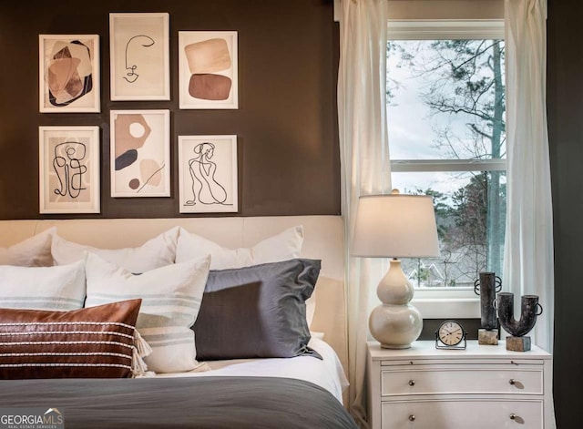 bedroom featuring multiple windows