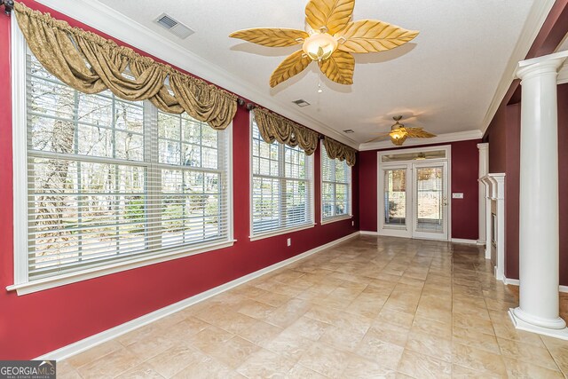 sunroom featuring ceiling fan