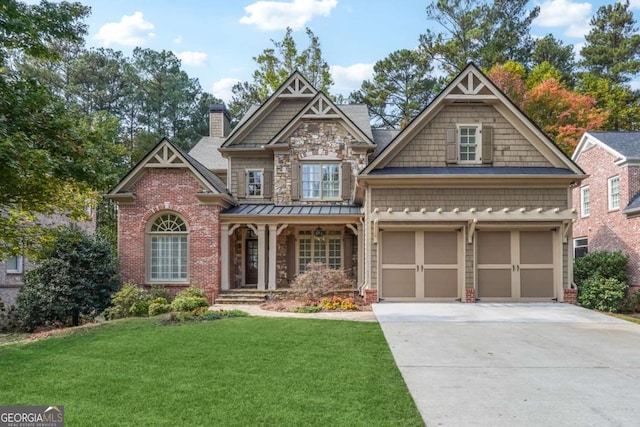 craftsman-style house with a front yard and a garage