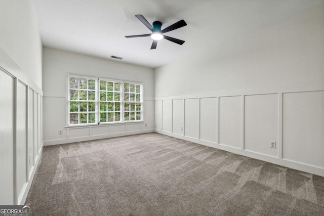 carpeted empty room with ceiling fan