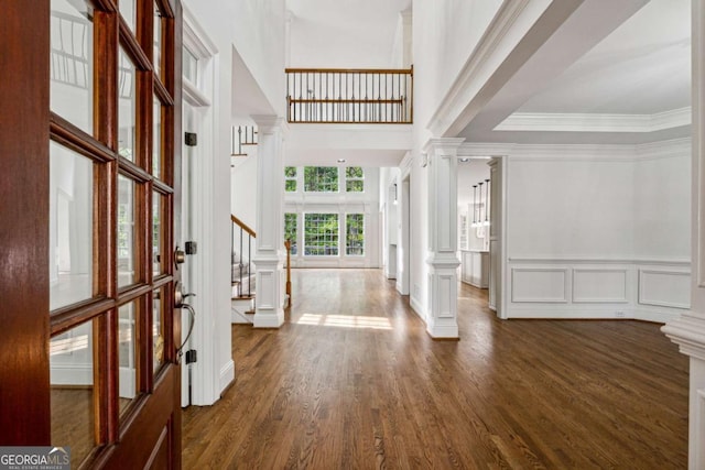 entrance foyer with french doors and dark wood-type flooring