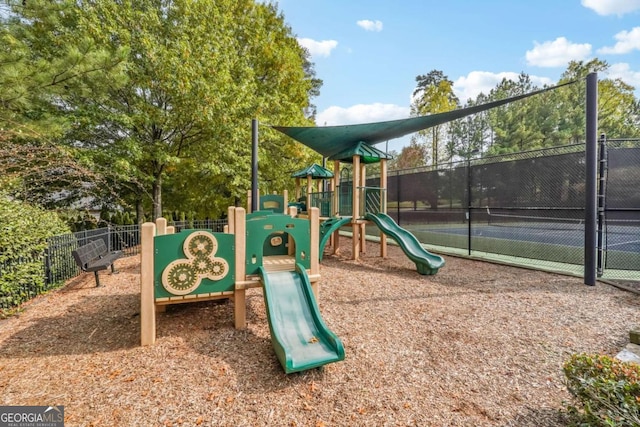 view of playground with tennis court