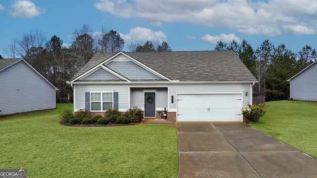 view of front of property with a front lawn and a garage