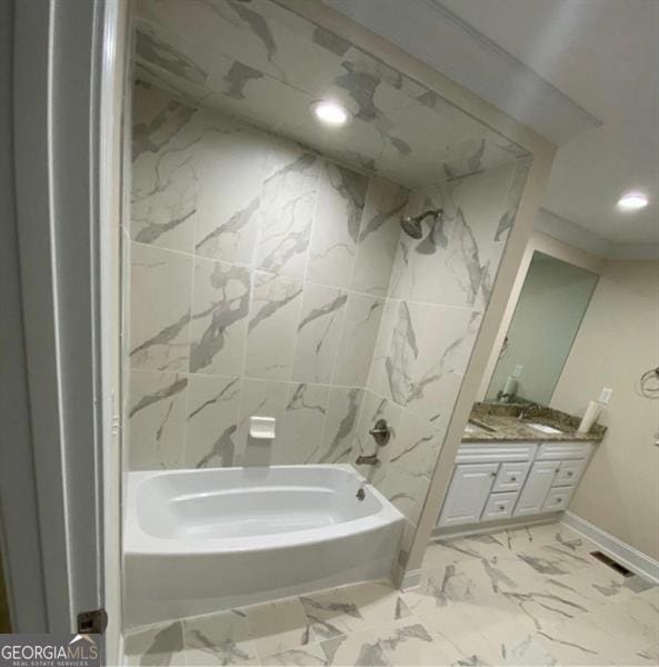 bathroom with vanity and tub / shower combination