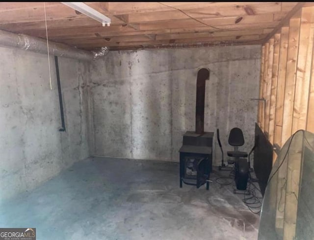 basement with a wood stove