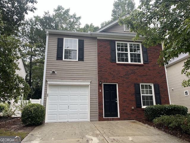 view of front of property featuring a garage