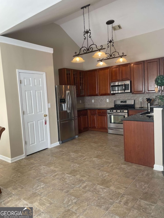 kitchen featuring backsplash, an inviting chandelier, sink, hanging light fixtures, and stainless steel appliances