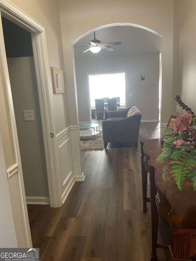 hall with dark hardwood / wood-style floors