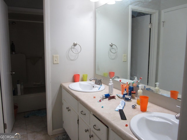 bathroom featuring tile patterned flooring and vanity