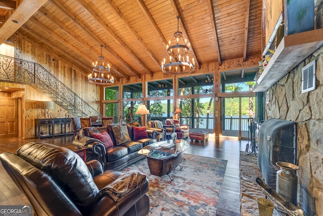 living room with beamed ceiling, wooden ceiling, and high vaulted ceiling