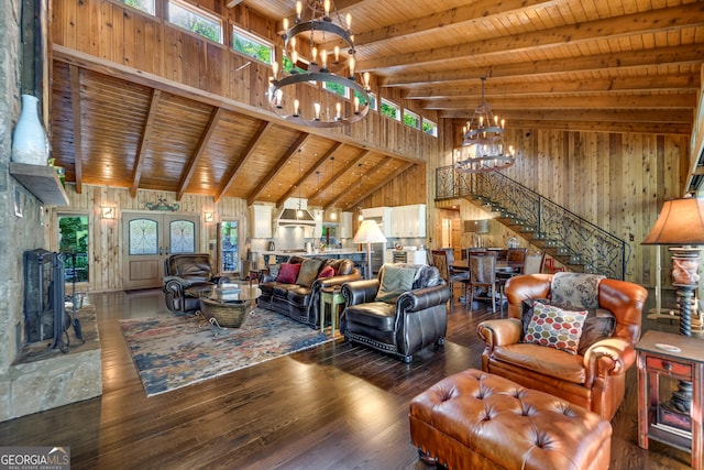 living room with dark hardwood / wood-style flooring, beam ceiling, high vaulted ceiling, wooden ceiling, and a chandelier