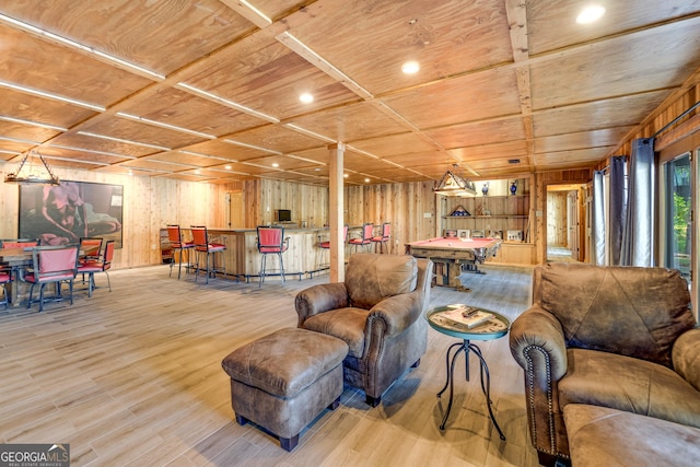 living room featuring light hardwood / wood-style floors, wooden ceiling, pool table, and coffered ceiling