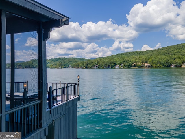 view of dock with a water view