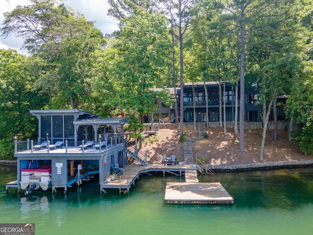 dock area with a water view