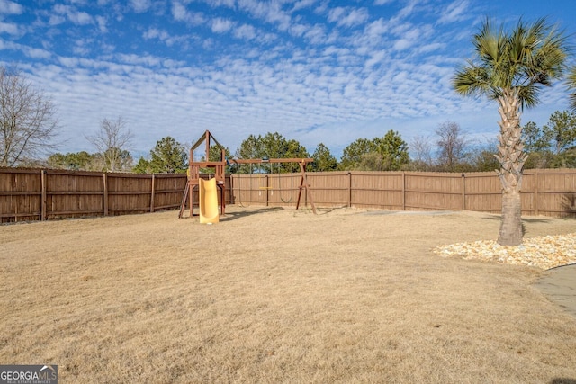 view of yard with a playground