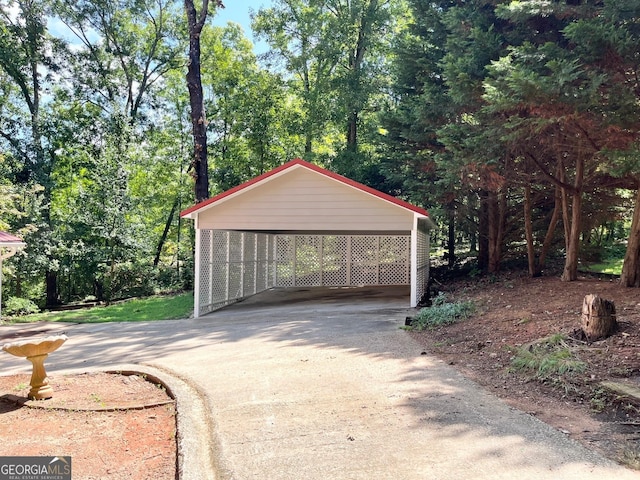 garage featuring a carport