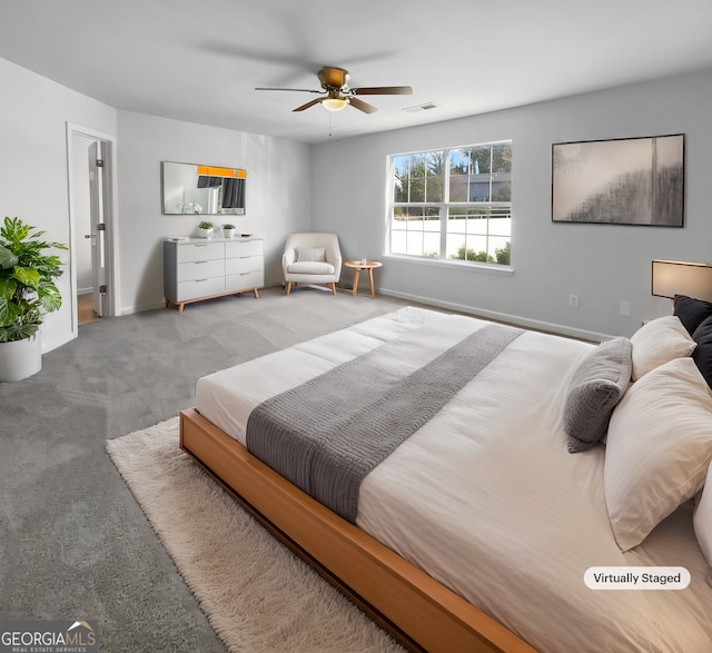 carpeted bedroom with ceiling fan