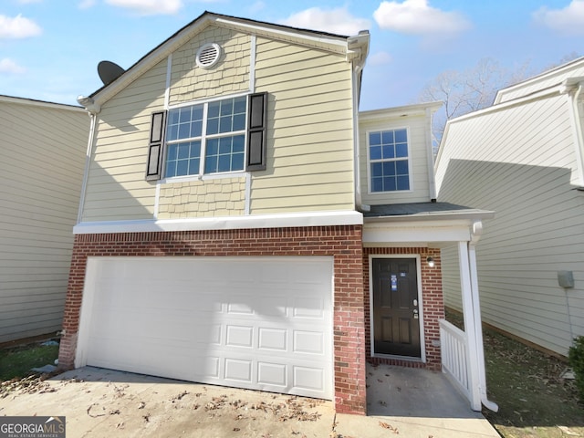 view of front of property with a garage