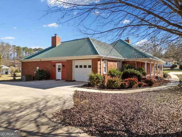 view of property exterior with a garage