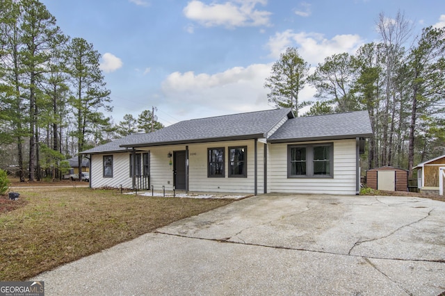 ranch-style home with an outbuilding