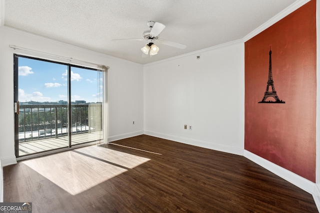 unfurnished room featuring a textured ceiling, ceiling fan, crown molding, and dark hardwood / wood-style floors