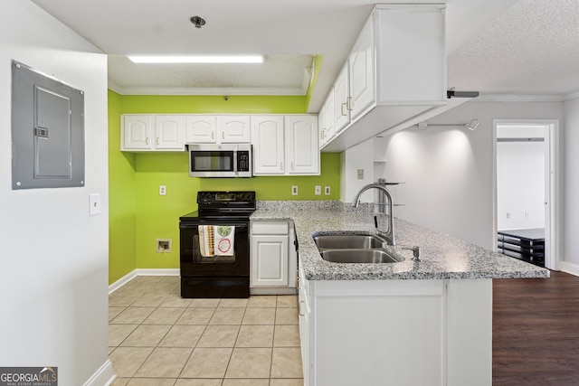 kitchen with white cabinets, crown molding, sink, black electric range, and electric panel