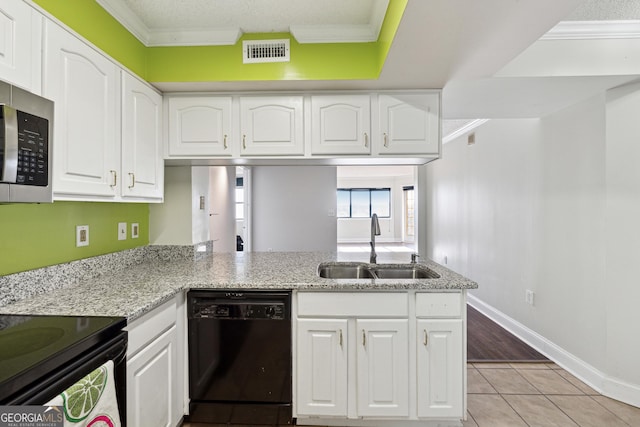 kitchen with kitchen peninsula, white cabinetry, sink, and black appliances