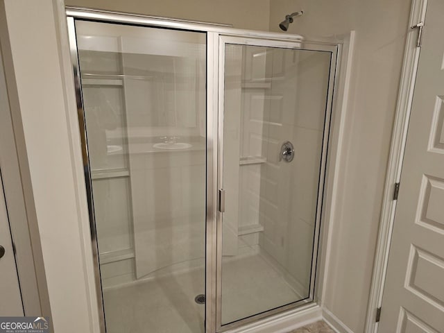 bathroom with an enclosed shower