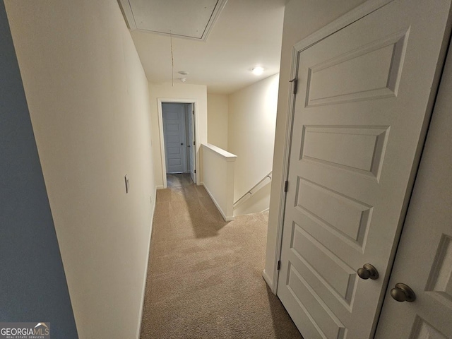 hallway with light carpet