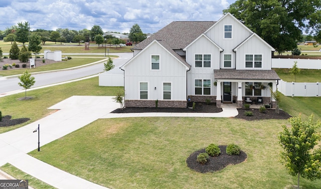 view of front of property with a front lawn