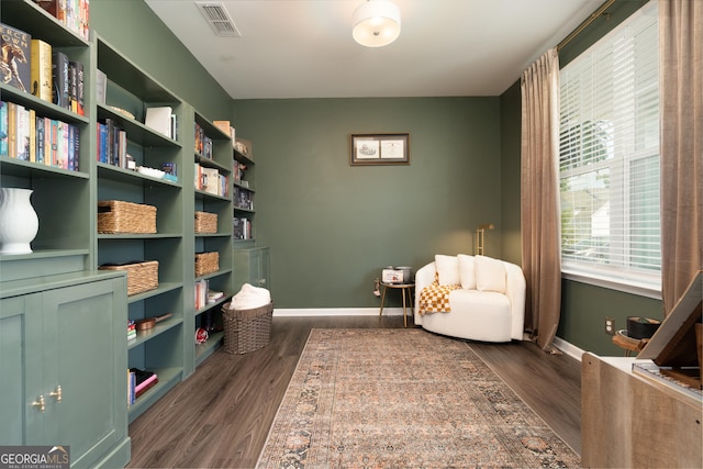 living area featuring dark hardwood / wood-style floors