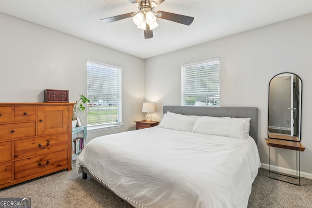 bedroom with carpet and ceiling fan