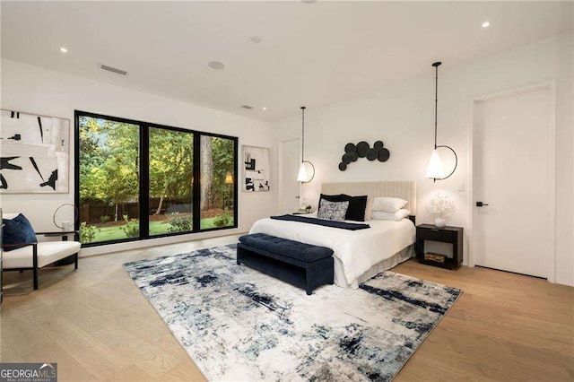 bedroom with light hardwood / wood-style flooring