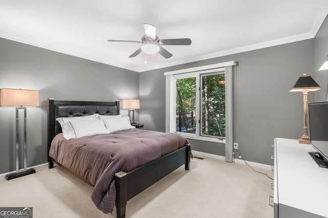 bedroom featuring light colored carpet, ceiling fan, and ornamental molding